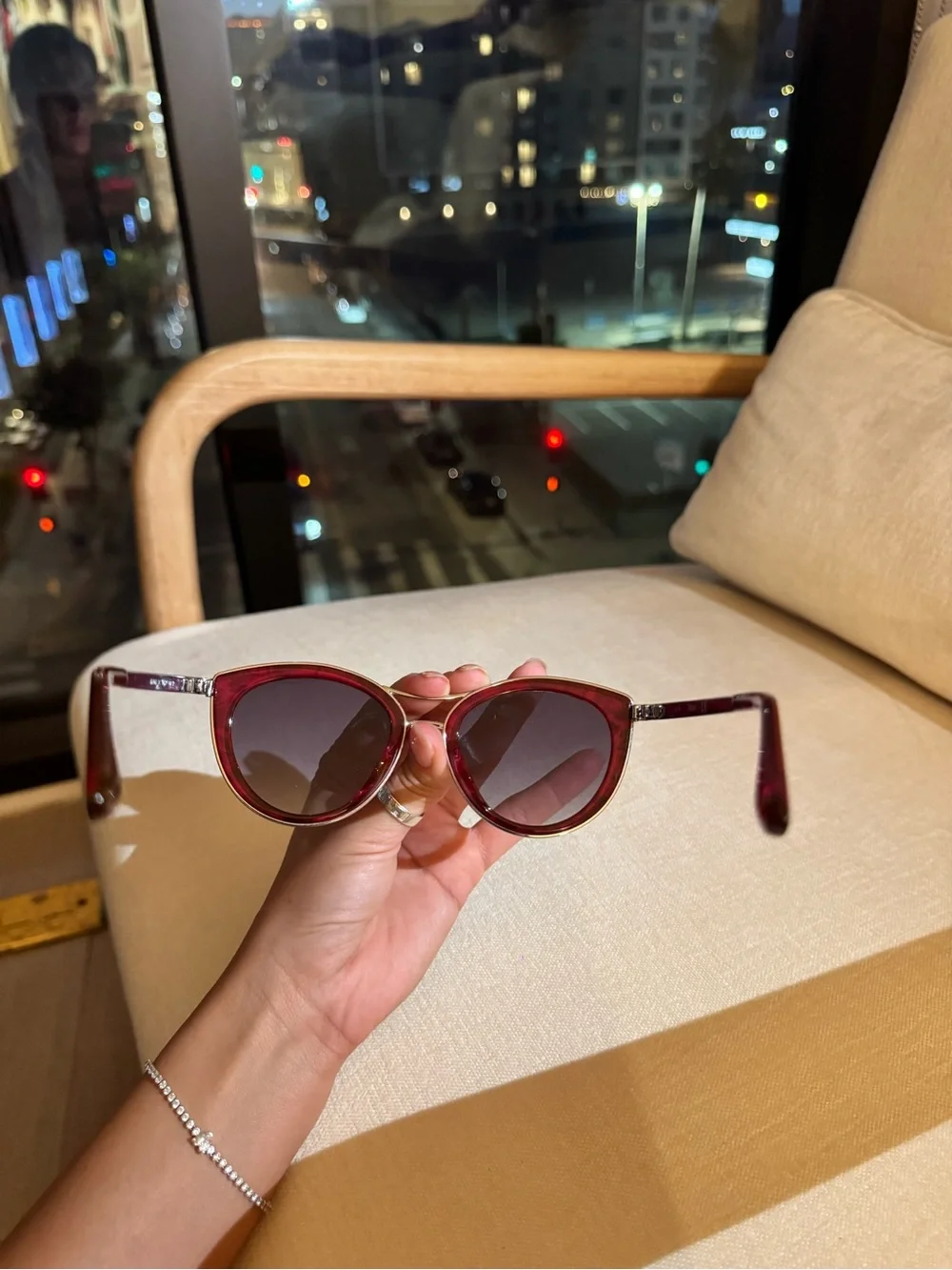 GUESS Pink Floral Cat-Eye Sunglasses with a silver bridge